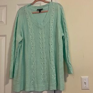 Plus size pullover sweater.